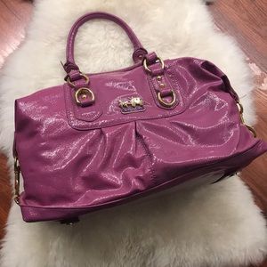 Coach Shiny lavender with gold accents Handbag.
